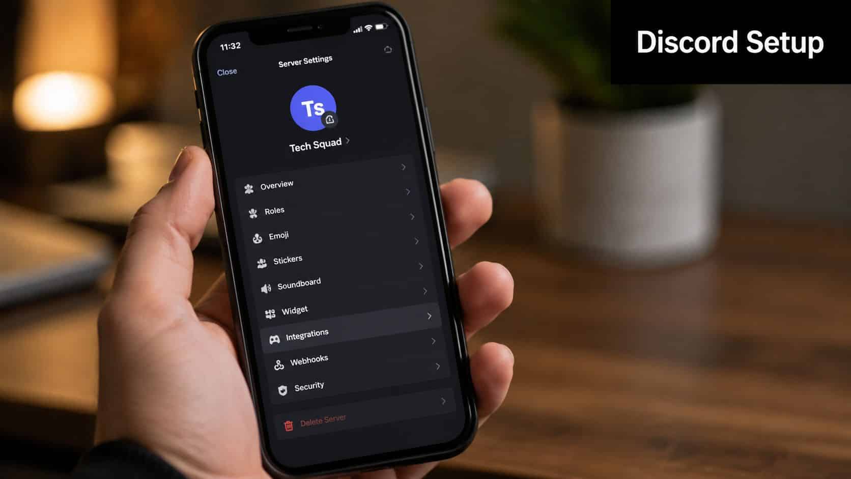 A hand holding a smartphone displaying Discord server settings menu, focusing on integration and webhook management options.